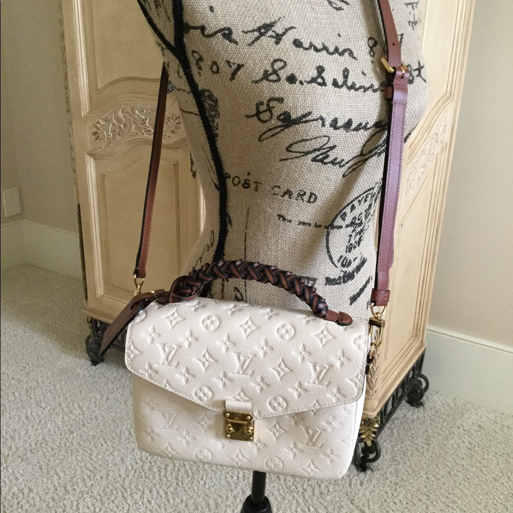 Louis Vuitton creme monogram handbag